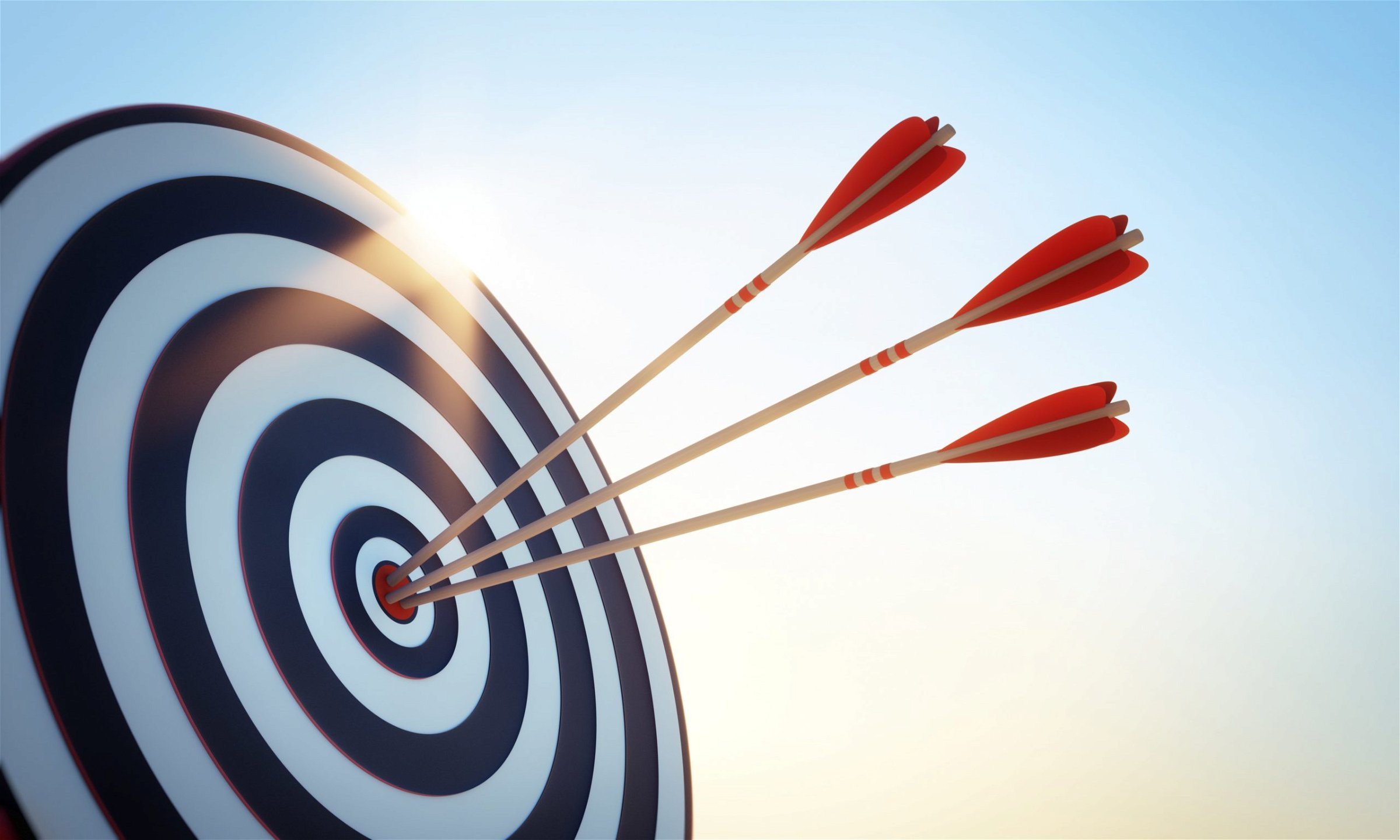 3 arrows in the bulls-eye of a target
